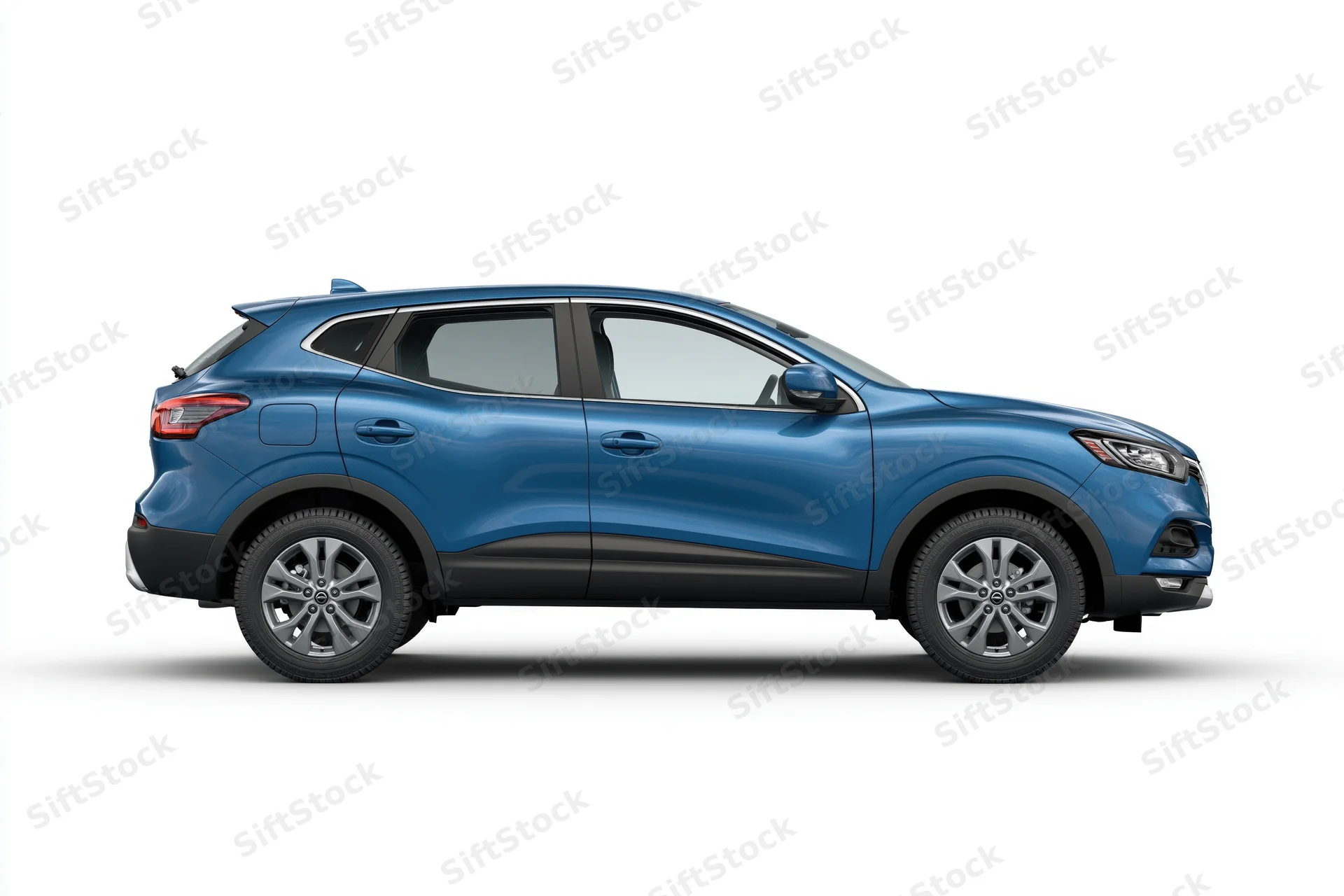 Blue compact suv in side profile view against white background