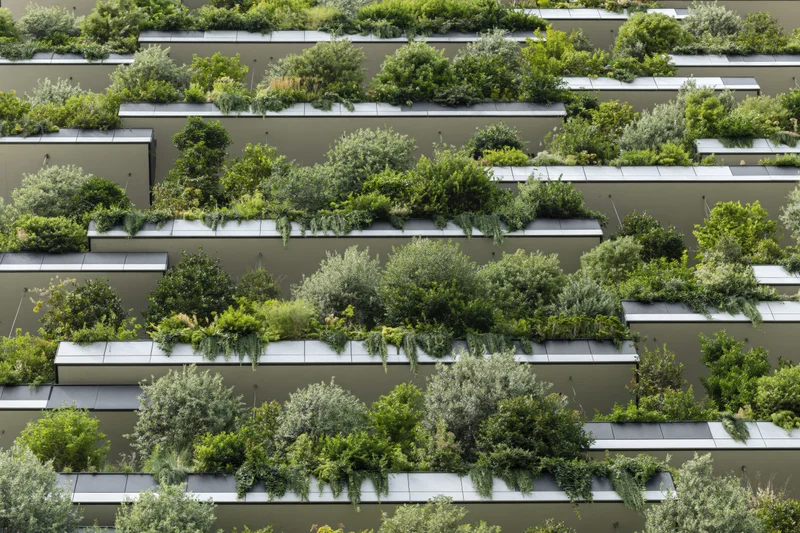 Tiered green wall on a modern residential building facade
