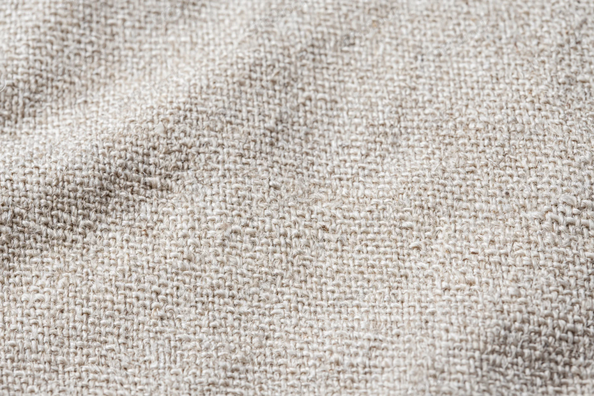 Close-up of natural linen fabric texture filling the frame