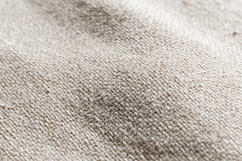 Close-up of natural linen fabric texture filling the frame