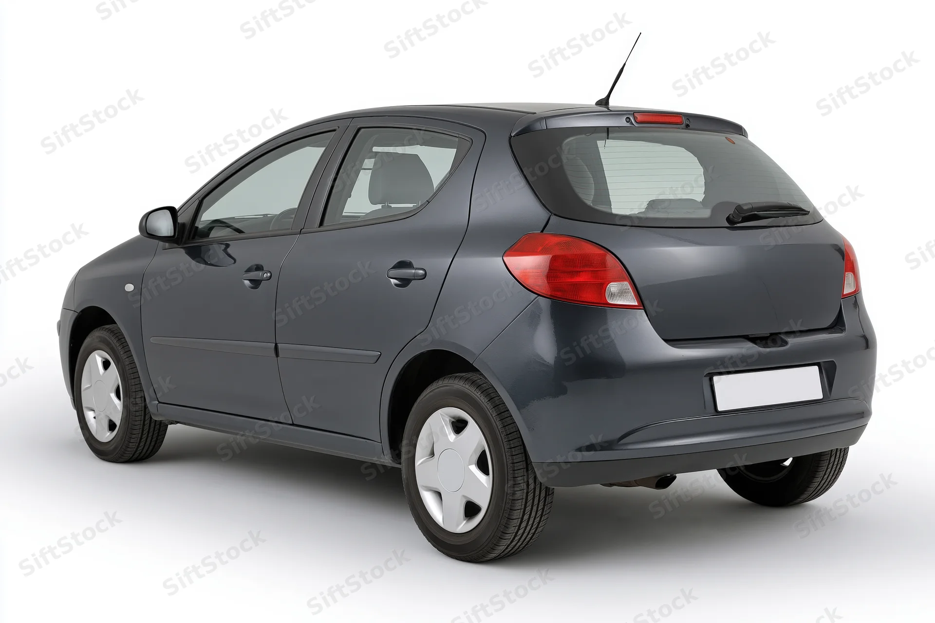 Dark grey compact hatchback viewed from rear three-quarter angle on white background