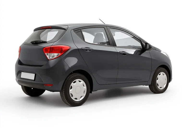 Dark grey compact hatchback car photographed from the rear