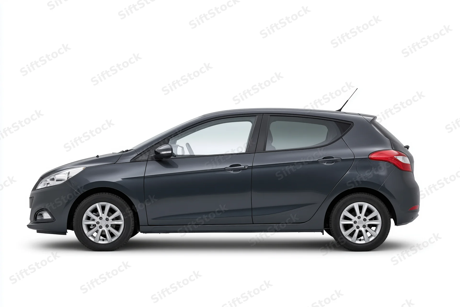Dark grey compact hatchback in side profile on white background