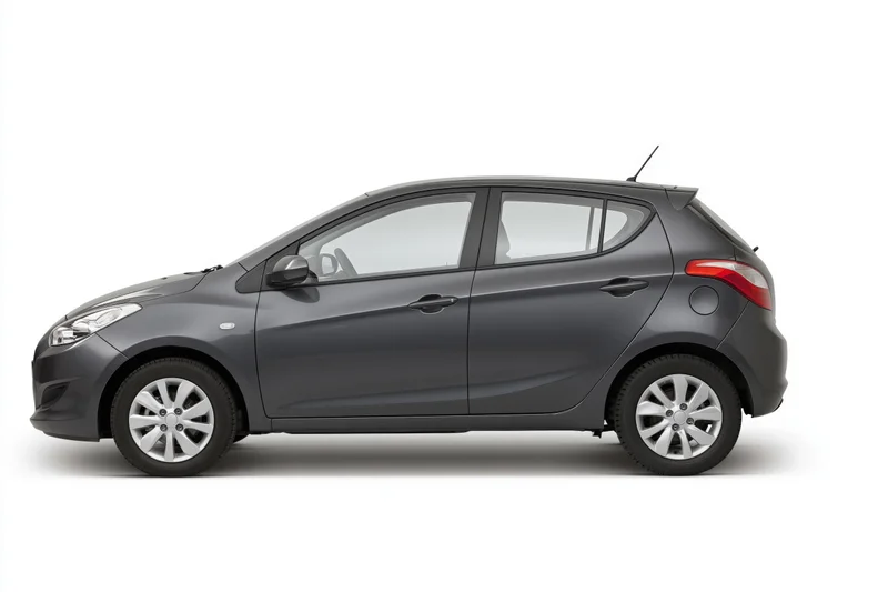 Dark grey compact hatchback in side profile on white background