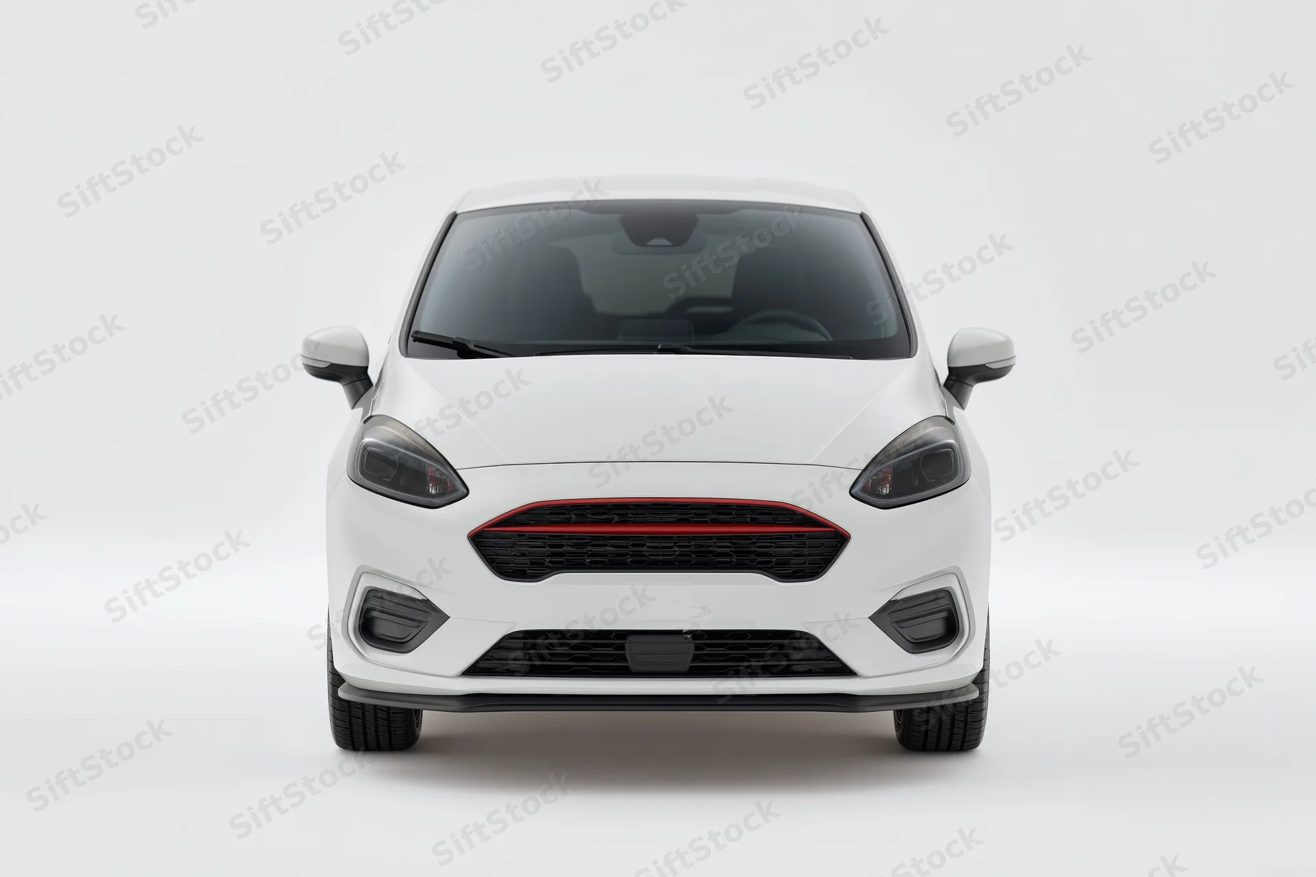 White compact hatchback front view in studio setting