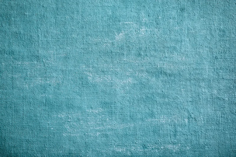 Teal painted canvas texture filling the frame