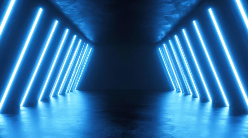Symmetrical futuristic tunnel illuminated by blue neon lights along walls and ceiling