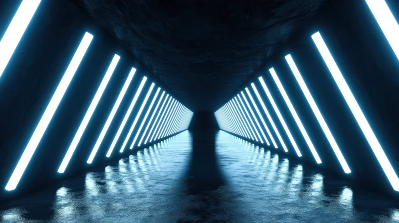 Symmetrical futuristic tunnel with blue neon lights reflecting on wet floor