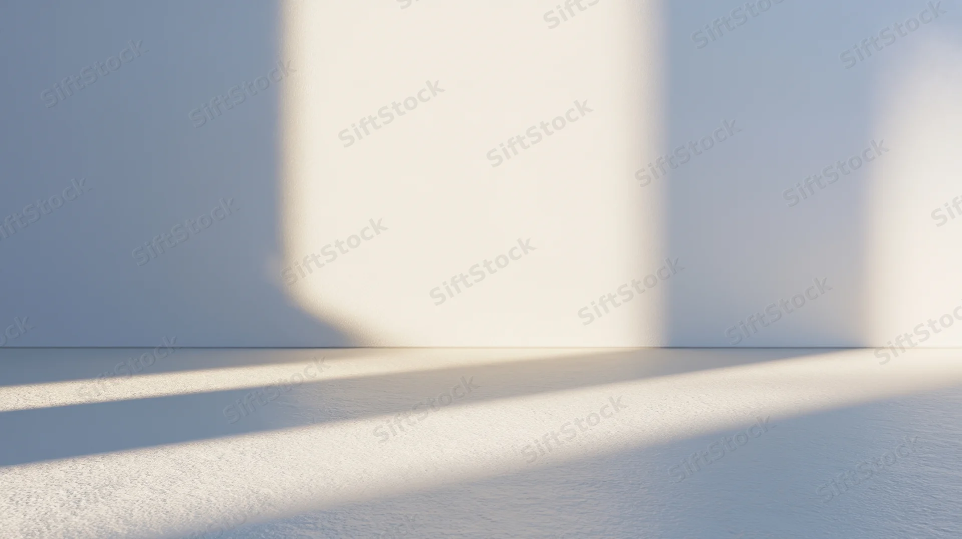 Minimalist interior with soft sunlight casting shadows on white walls and floor