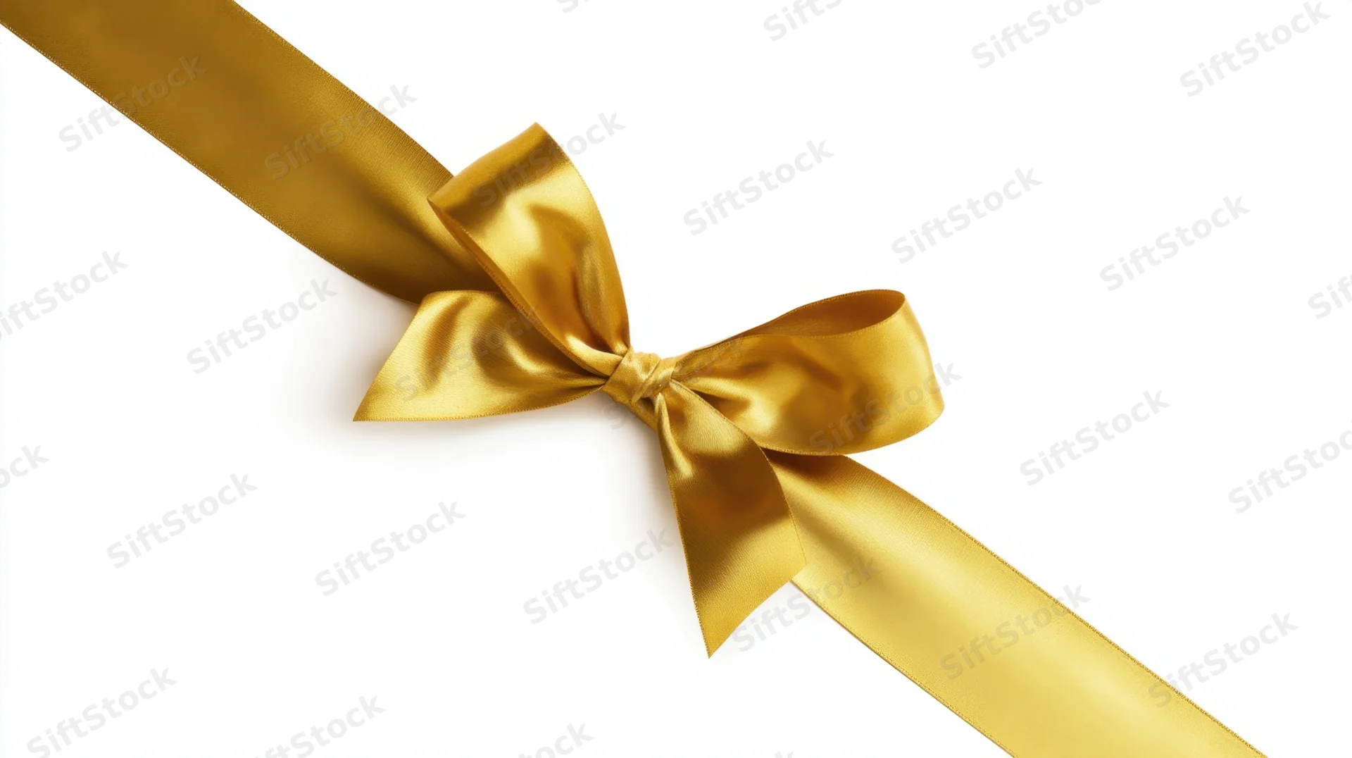 Golden satin ribbon tied in a bow on white background