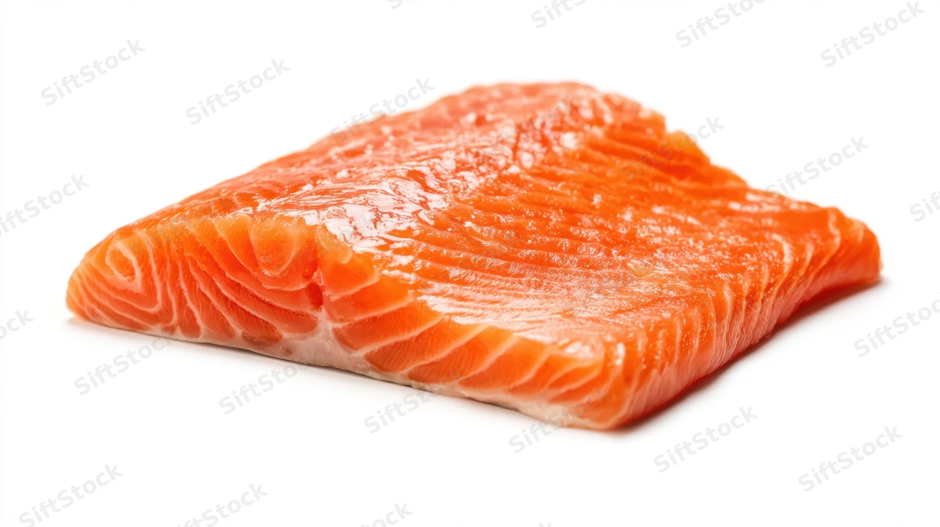 Raw salmon fillet on white background