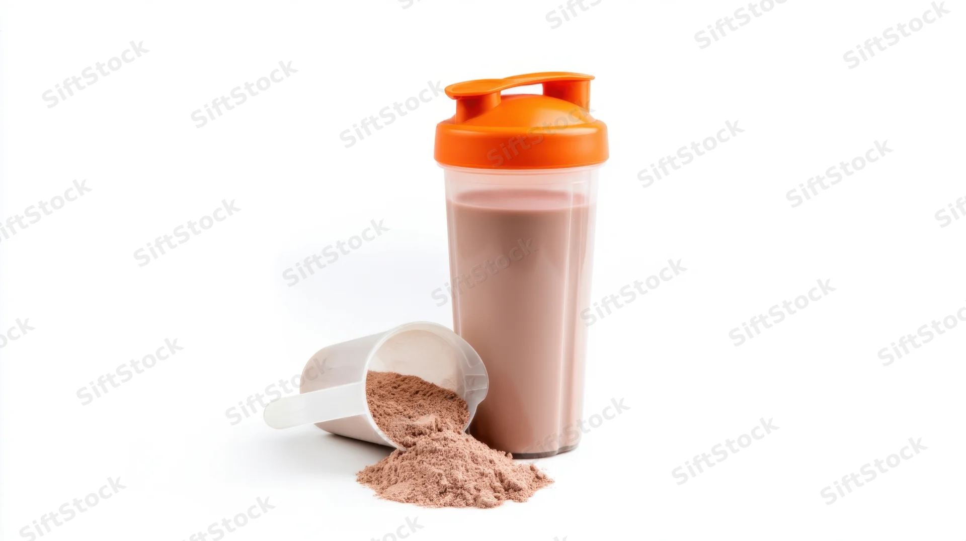 Protein shake in a shaker bottle with spilled powder and scoop on white background