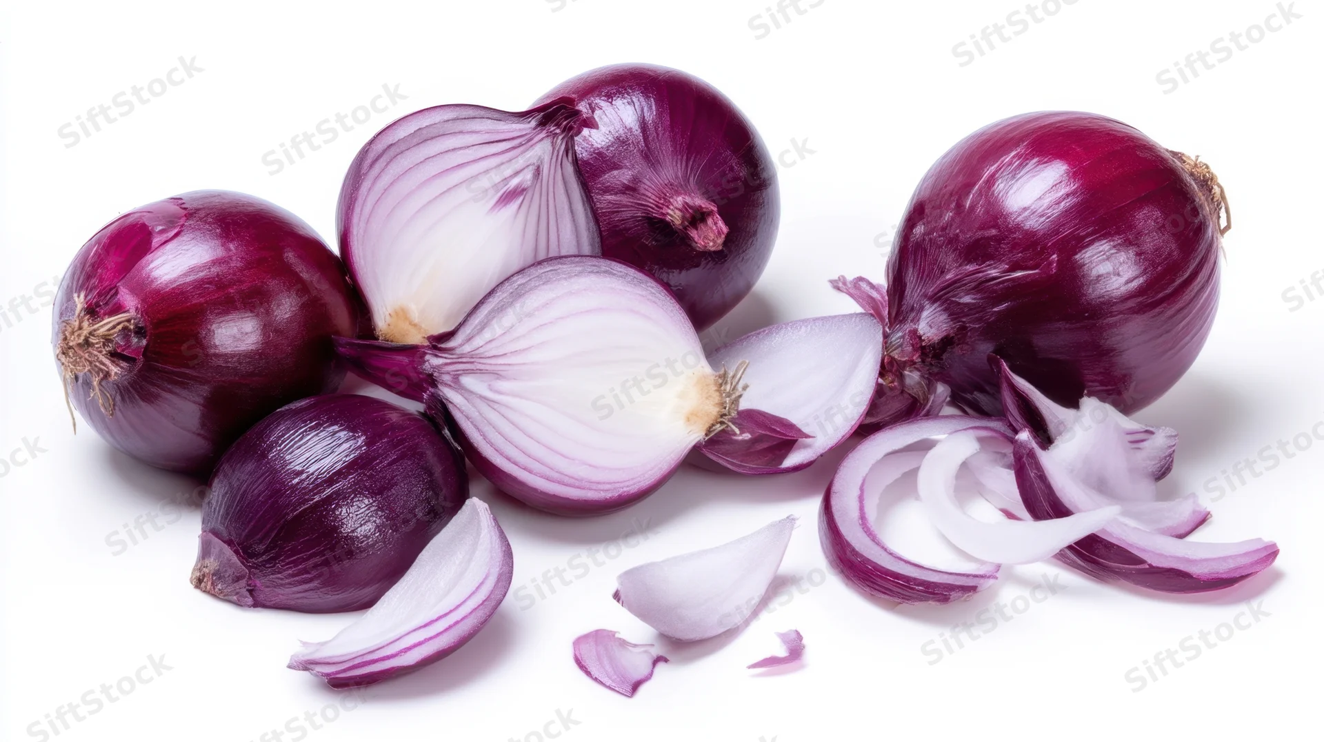 Red onions whole and sliced on white background