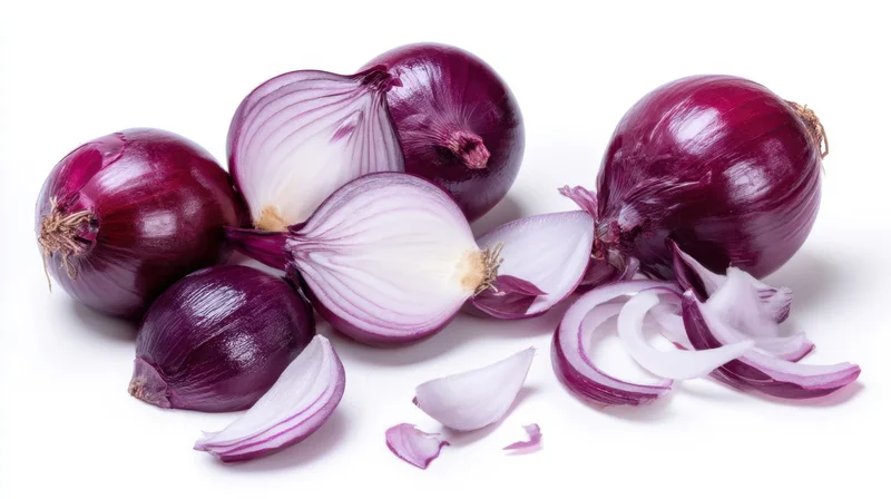 Red onions whole and sliced on white background
