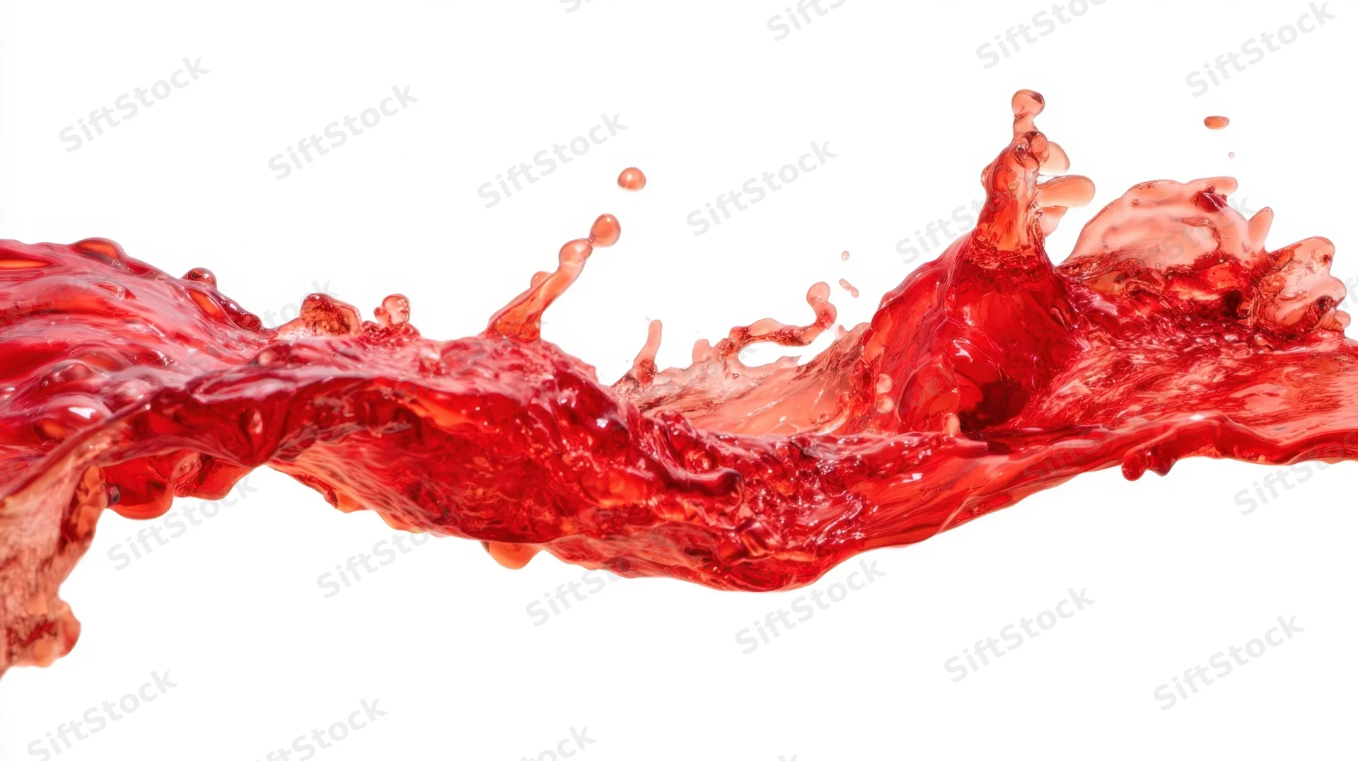 Red liquid splashing dynamically against white background
