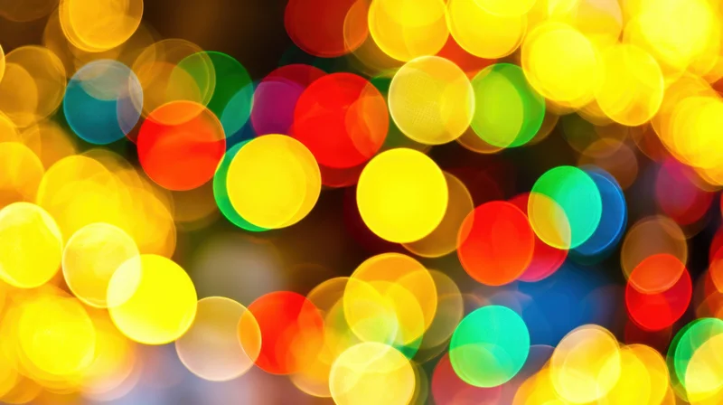 Vibrant colorful bokeh lights in abstract festive background