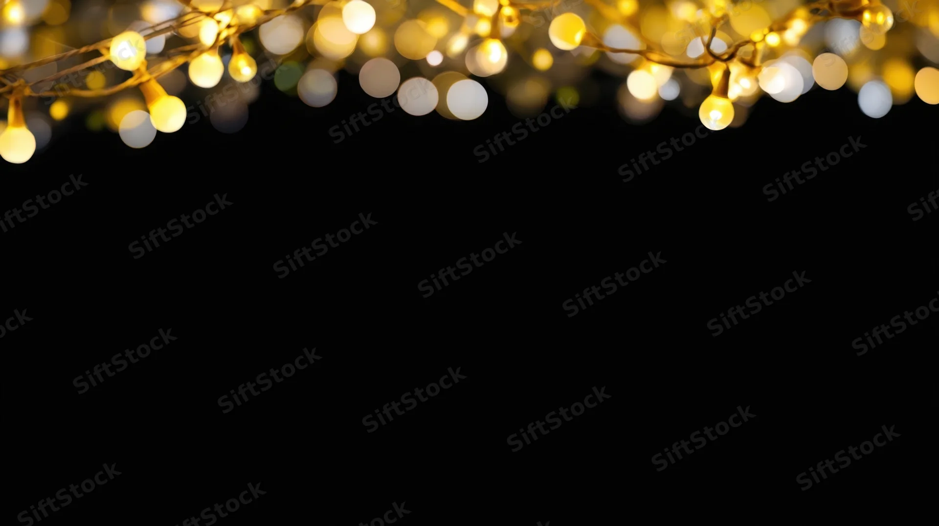 Decorative string lights glowing at top of frame against black background with copyspace below