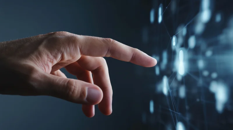 Hand reaching to touch a glowing digital network interface in a dark space