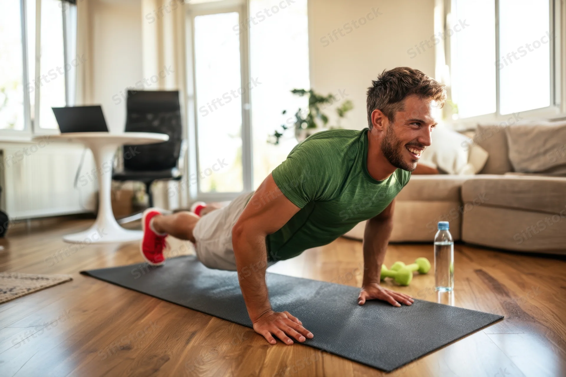 Man doing pushup on exercise mat in living room