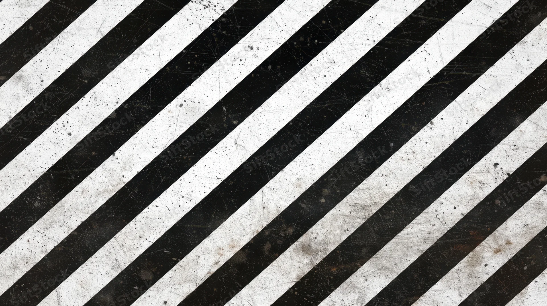 Diagonal black and white stripes with grunge texture covering the frame