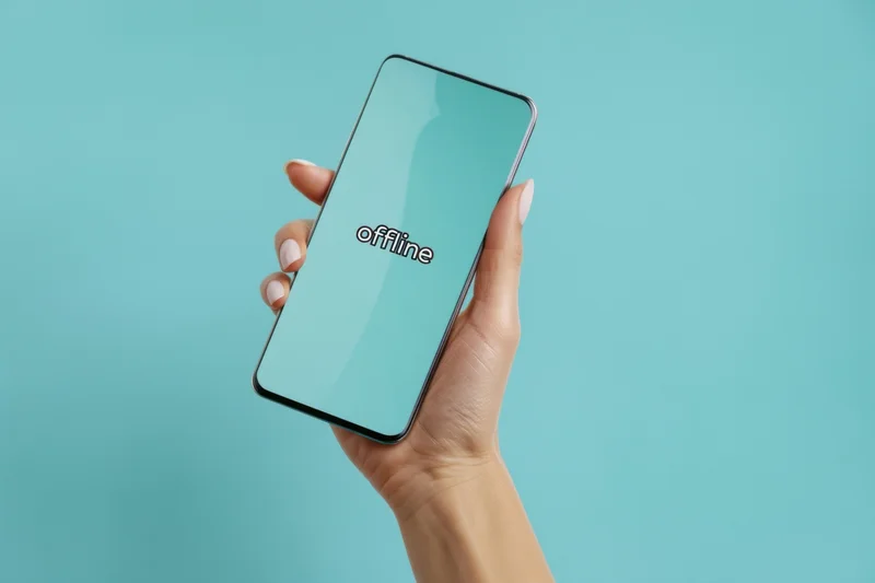 Woman holding smartphone with offline message on screen against teal background