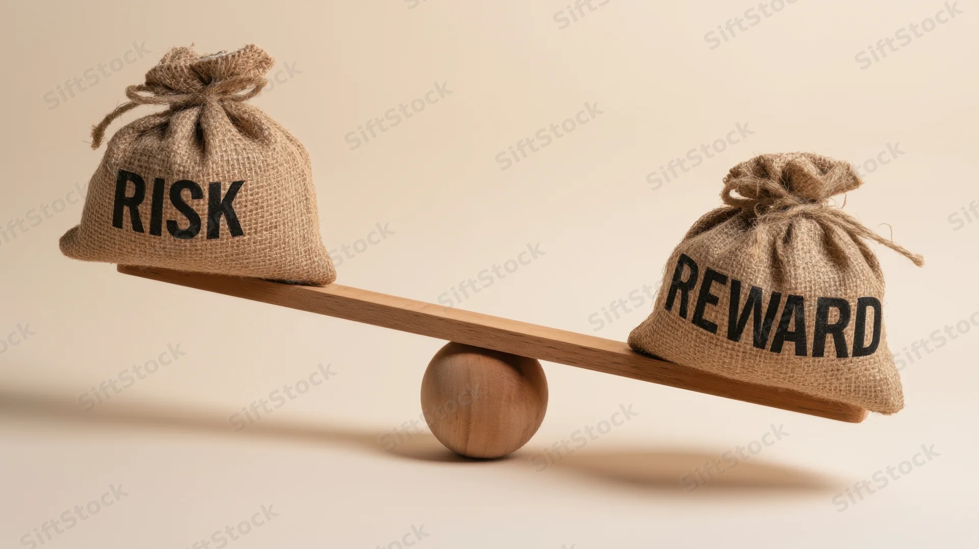 Two burlap sacks labeled risk and reward balanced on a wooden scale with a ball fulcrum