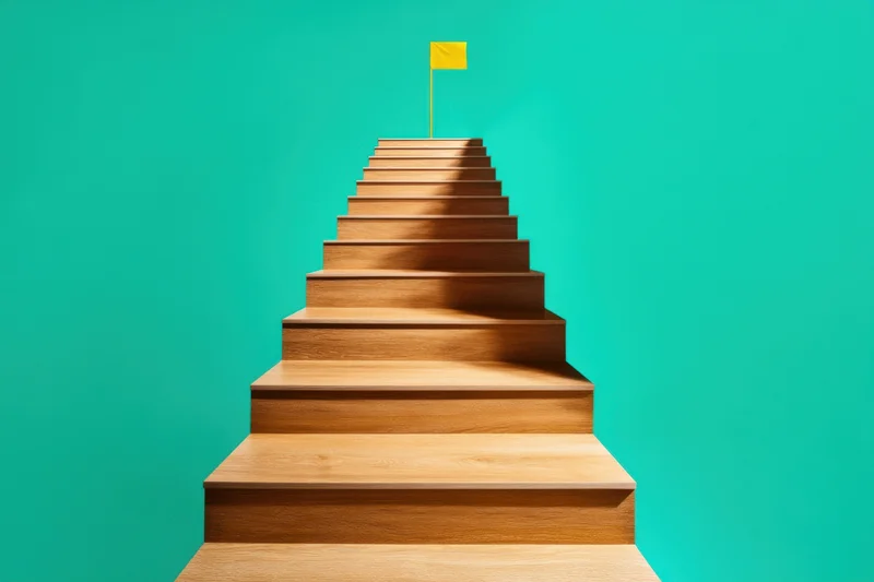 Wooden staircase leading upward to a yellow flag at the top against a teal background