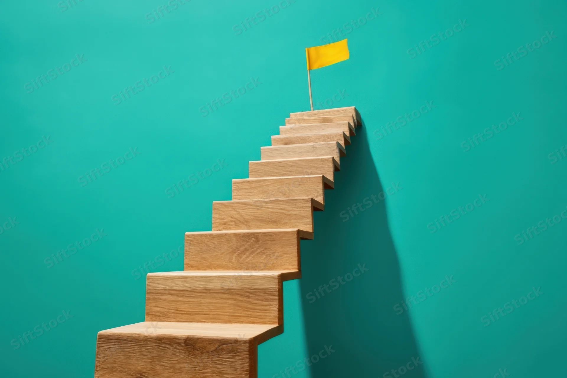 Wooden staircase ascending to a yellow flag against a teal background