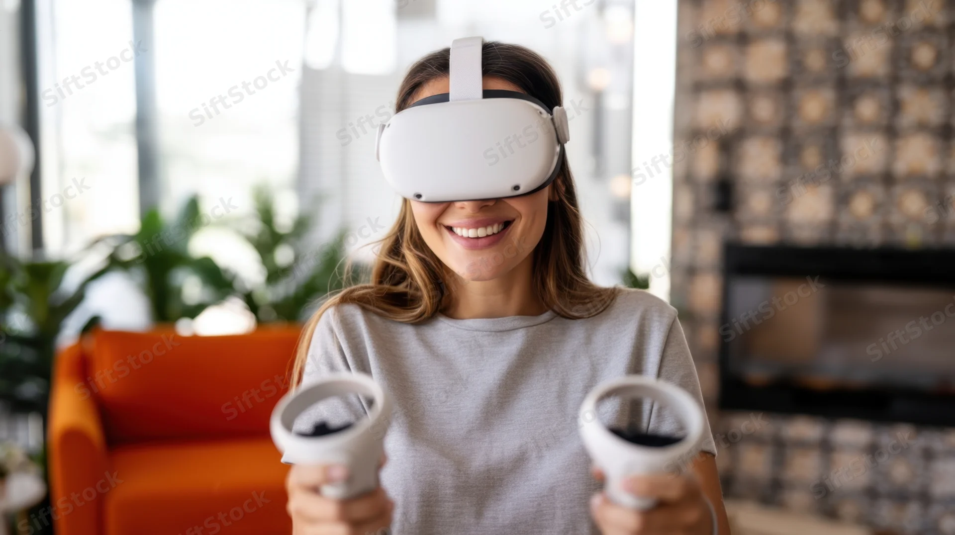 Young woman smiling while using vr headset and controllers in living room