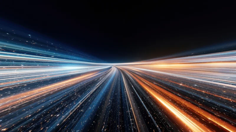 Abstract light streaks converging in a tunnel-like perspective at night