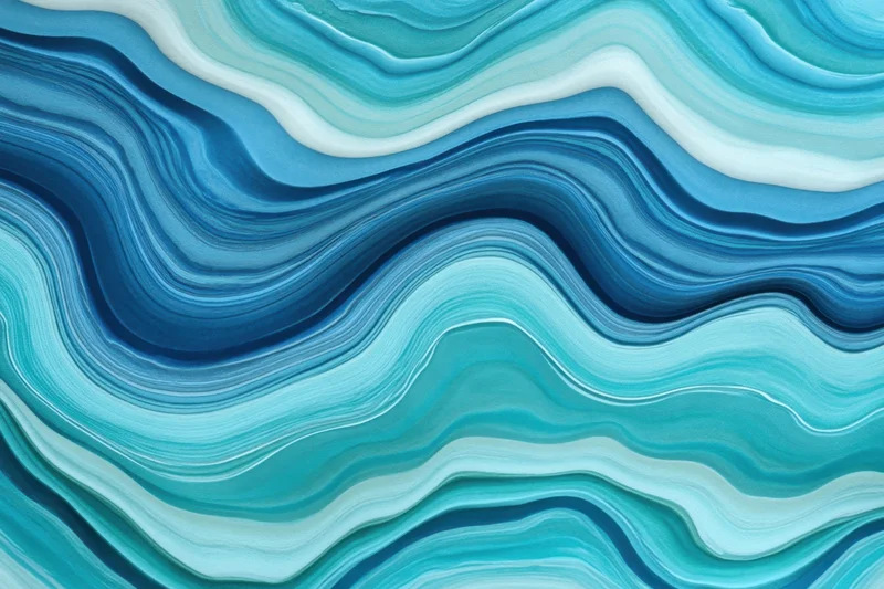 Close-up of blue and teal wavy marble-like layered patterns