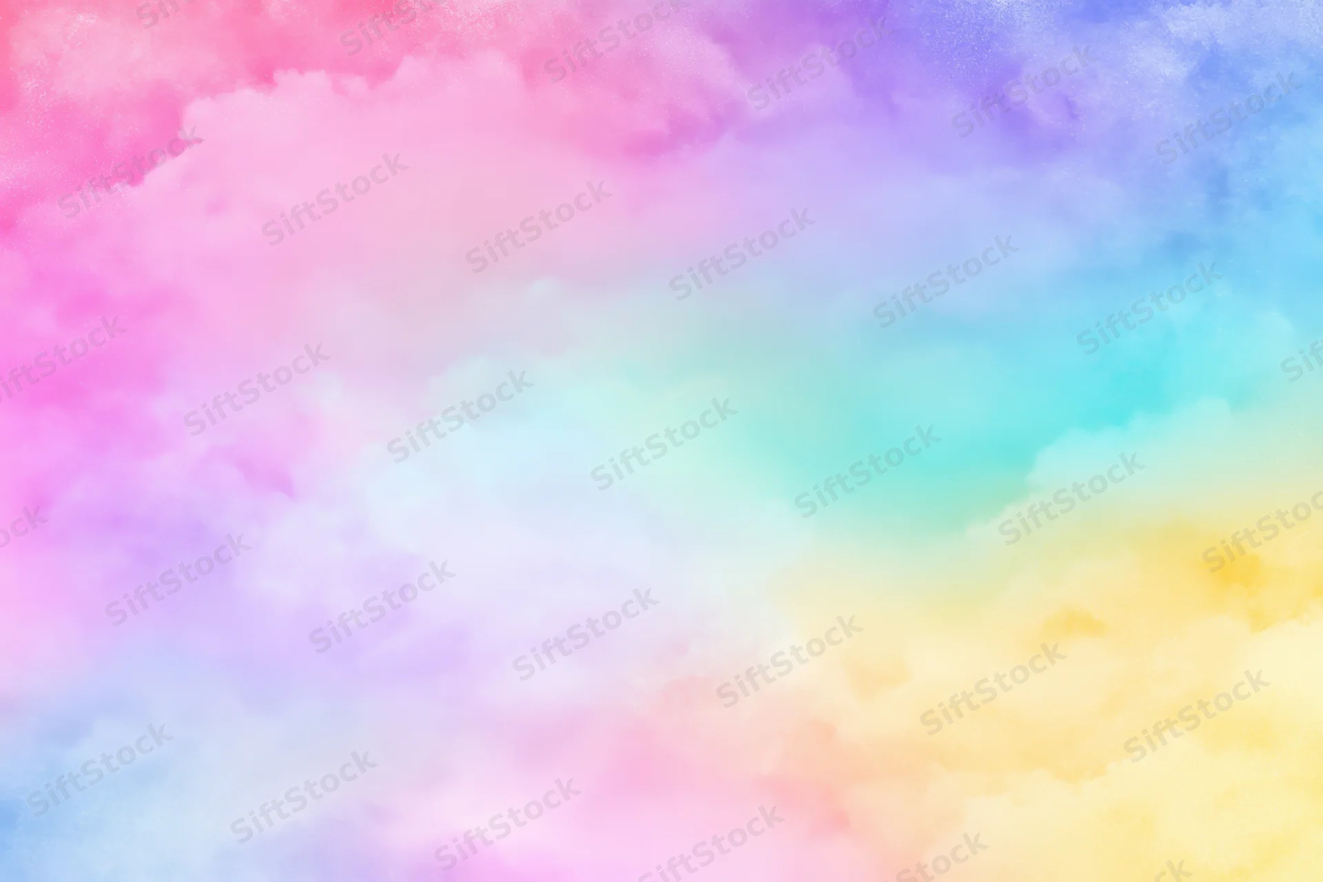 Soft pastel rainbow gradient blending in abstract cloud-like texture