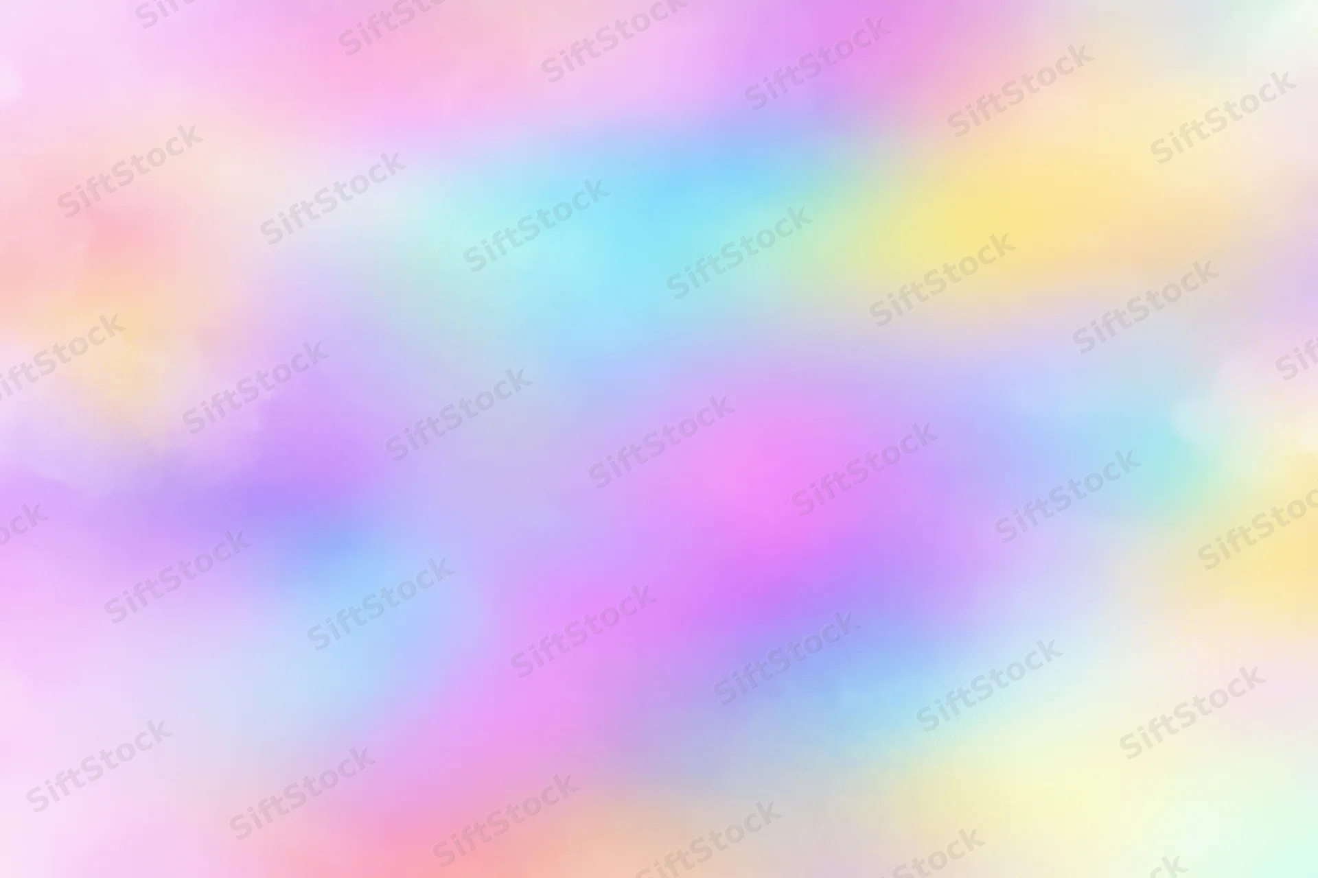 Soft pastel rainbow gradient blending across the frame as a dreamy abstract background