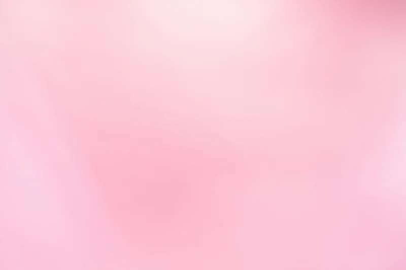 Soft pink gradient background with even glow and smooth texture