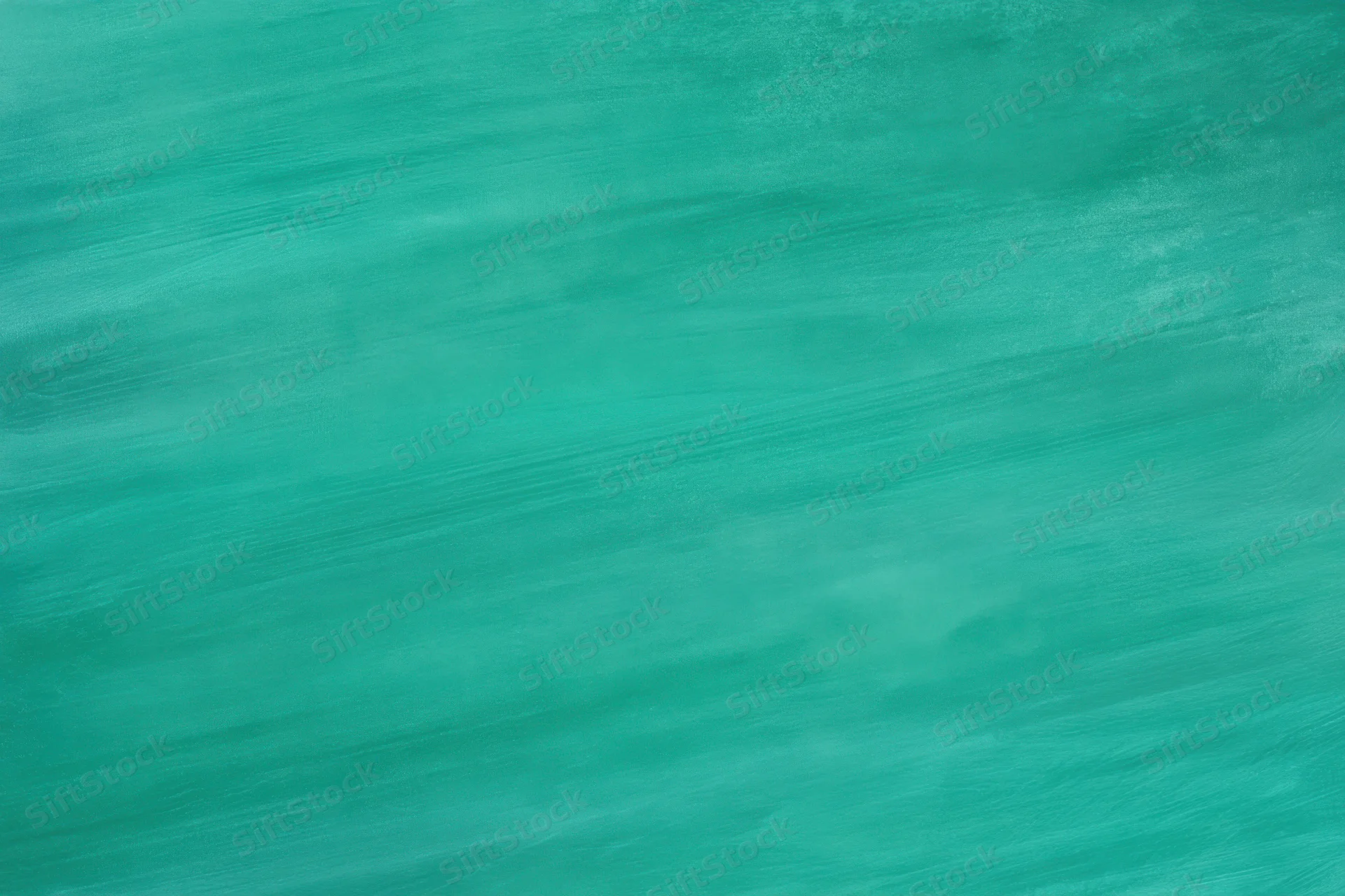 Teal-green painted backdrop with visible brush strokes and soft texture
