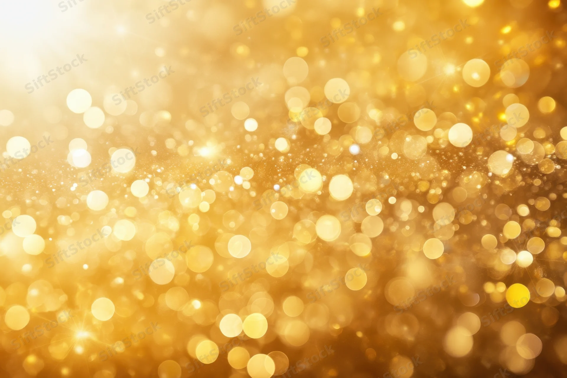 Golden bokeh lights shimmering in soft focus as a festive background