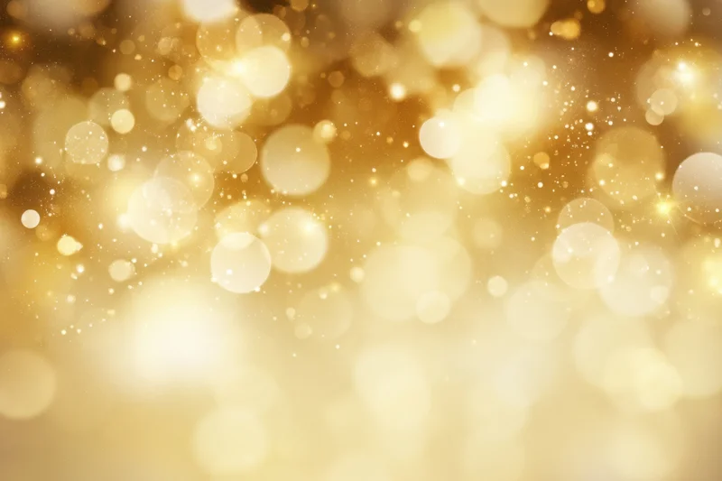 Golden bokeh lights shimmering softly in a festive abstract background