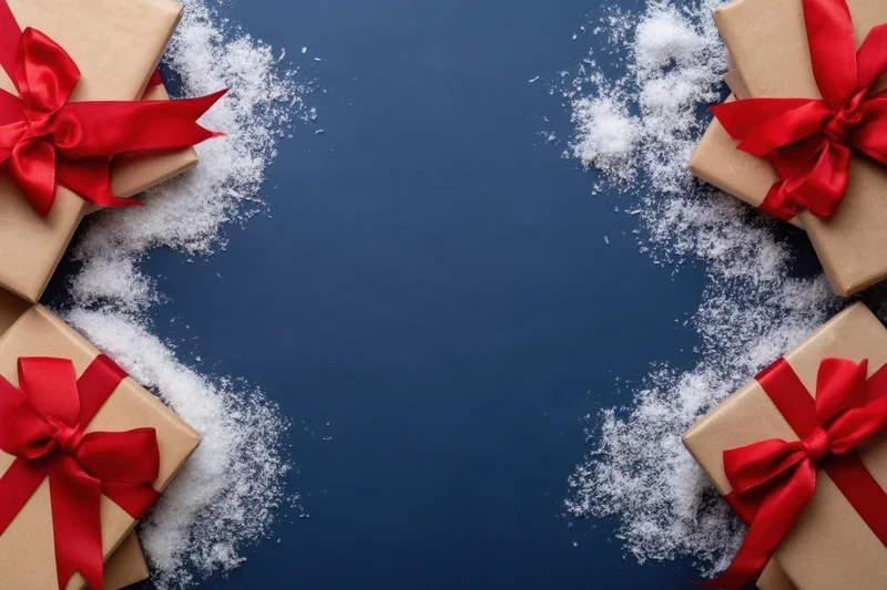 Symmetrical arrangement of kraft-wrapped gifts with red ribbons and snow on blue background