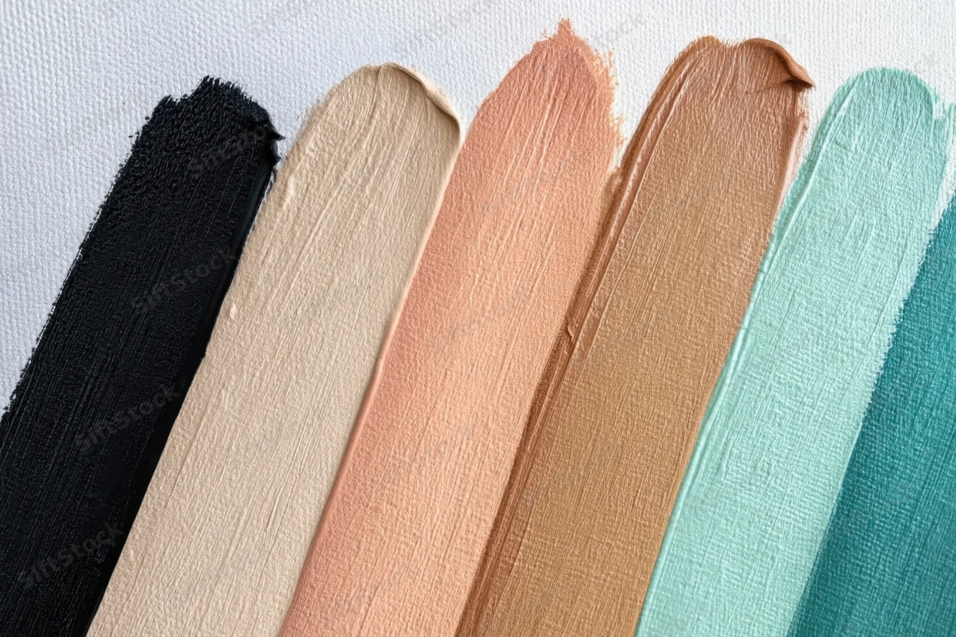 Diagonal brush strokes of paint in various colors on white canvas