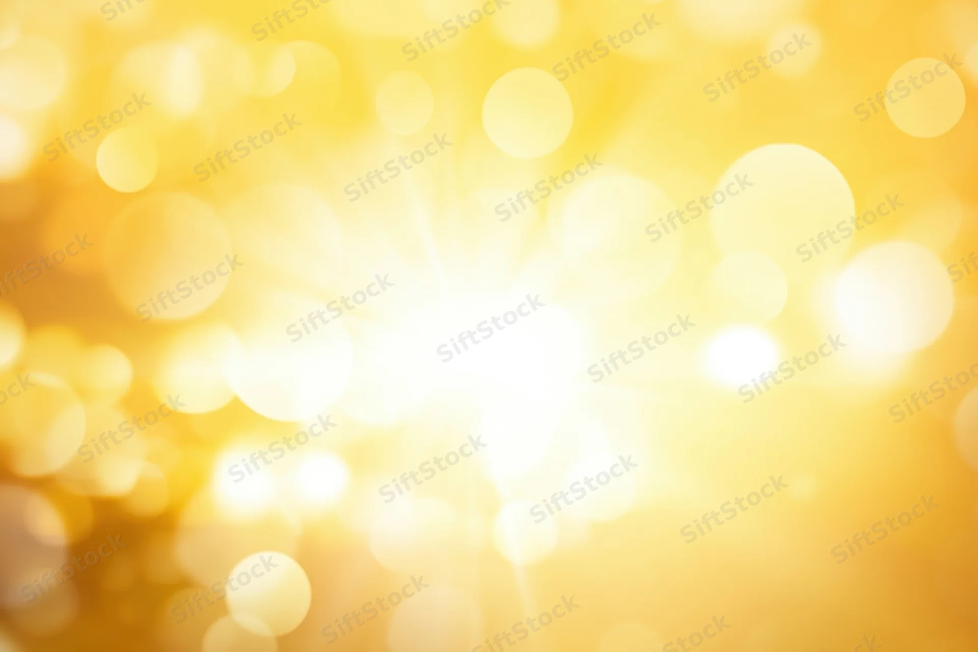 Golden bokeh light effect with soft highlights and warm glow