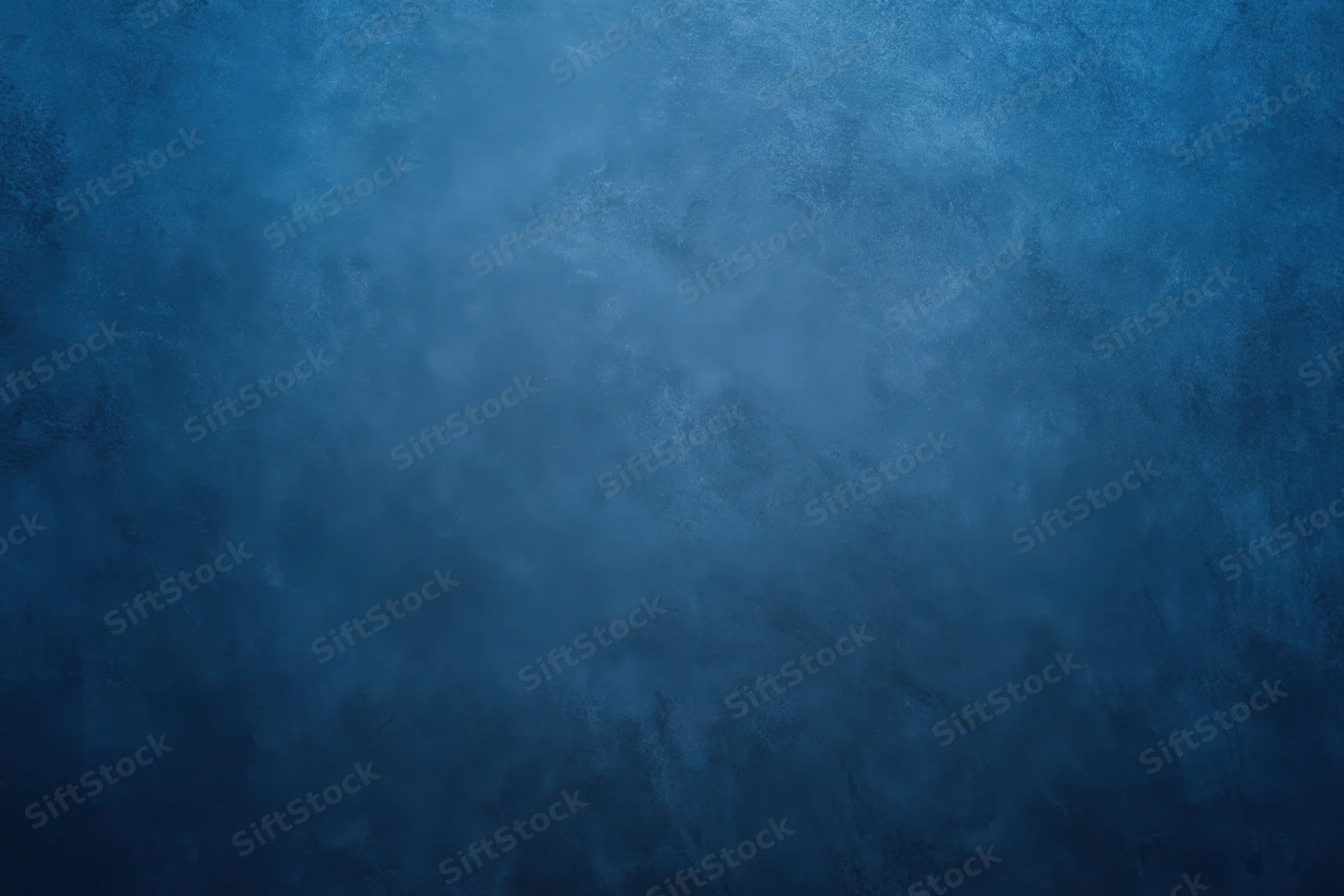 Dark blue grunge textured backdrop with subtle gradient and mottled surface