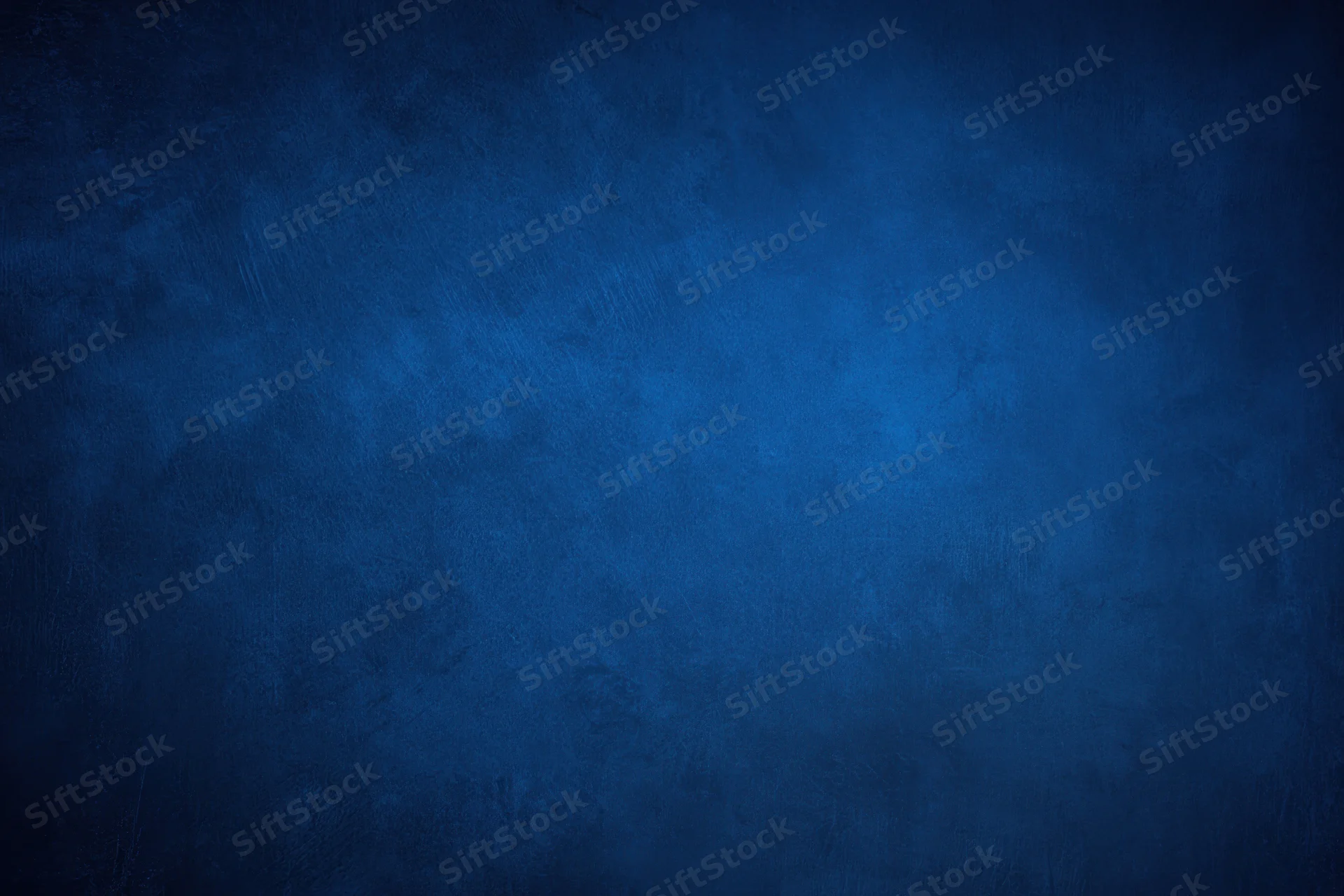 Dark blue grunge textured backdrop with subtle gradient