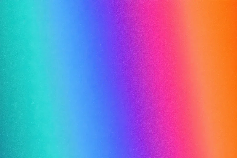 Vibrant gradient transitioning from teal to orange across a textured surface