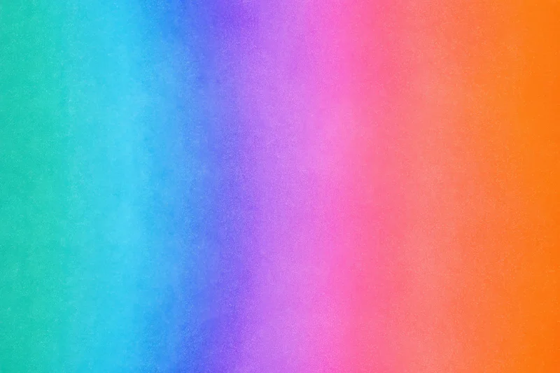 Vibrant gradient transitioning from teal to orange across a textured surface