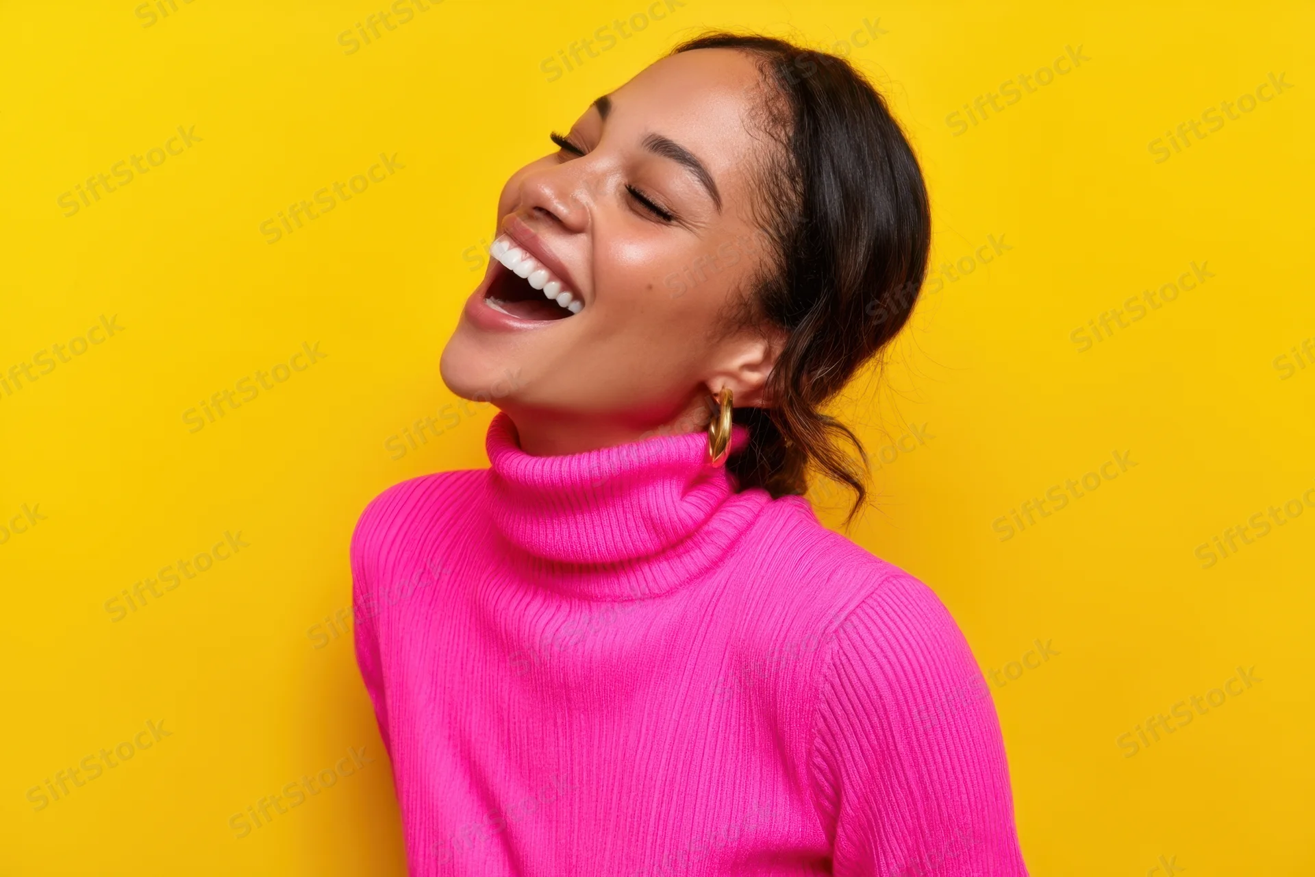 Woman laughing joyfully in a bright pink ribbed turtleneck against a yellow background