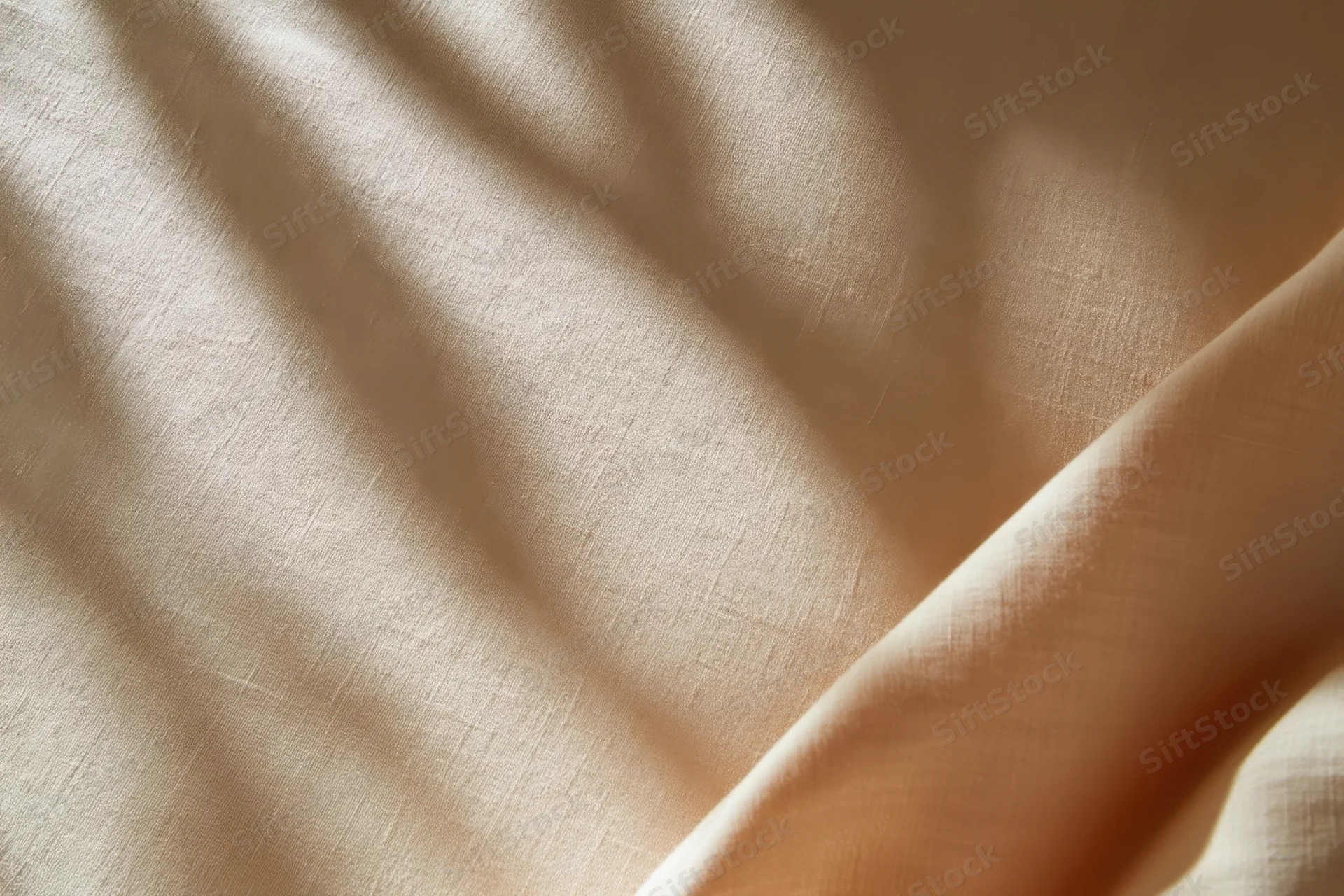 Light beige fabric with dappled leaf shadows and soft folds
