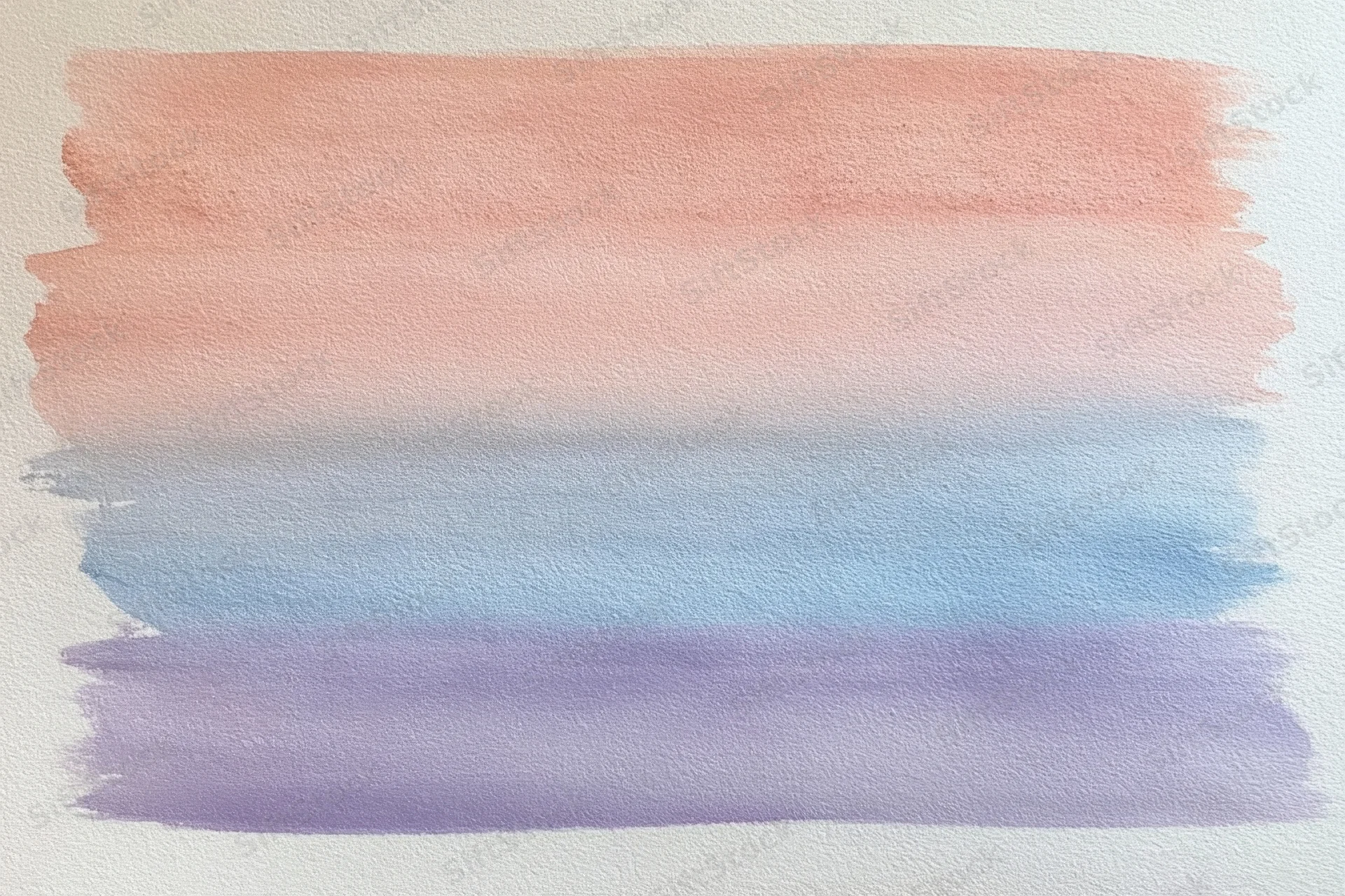 Soft pastel watercolor wash blending peach pink blue and purple on textured paper