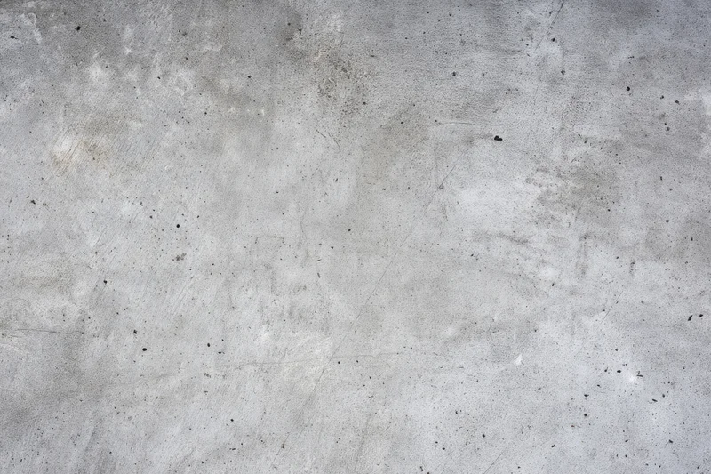 Weathered concrete surface with gray tones and rough texture