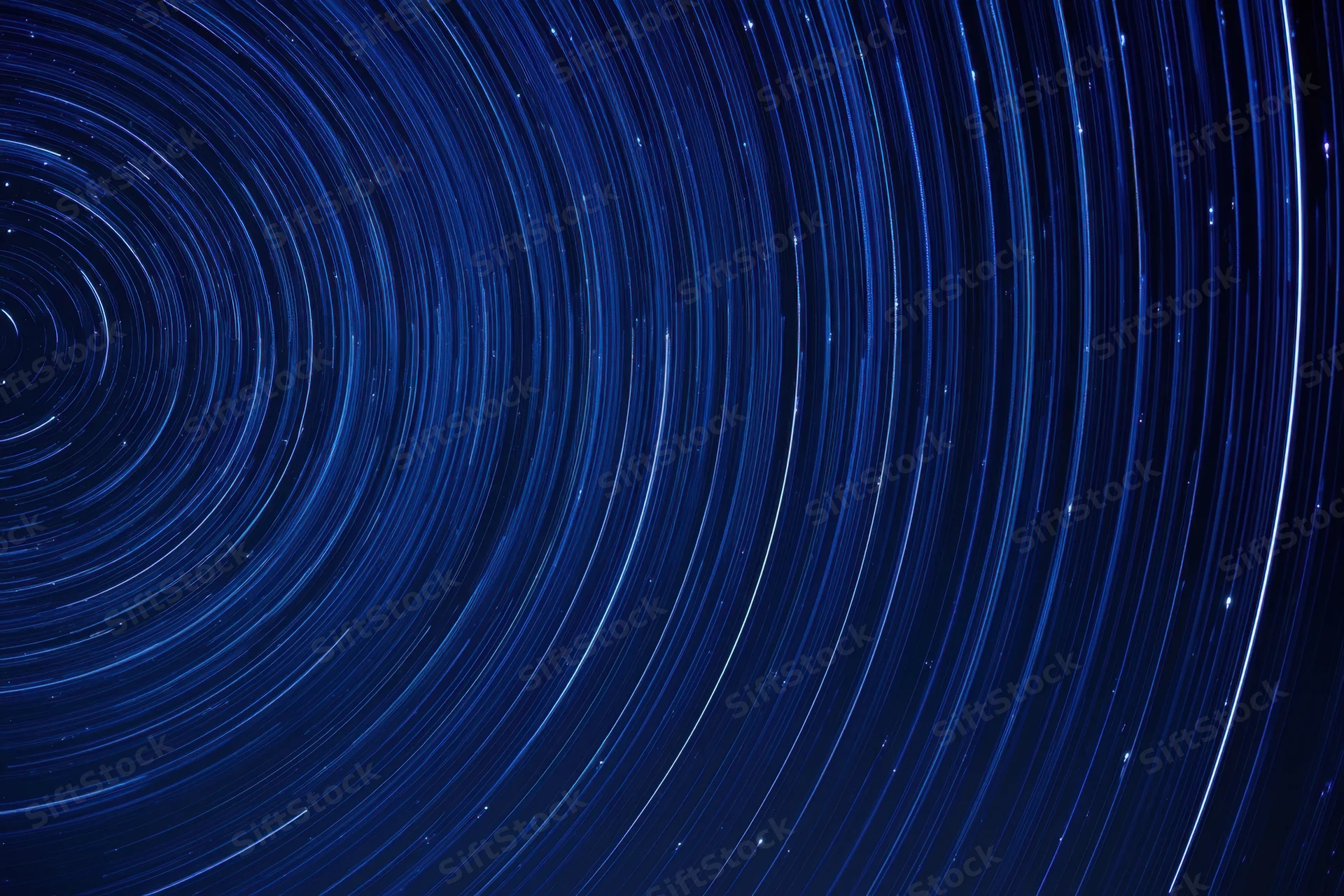 Circular star trails in the night sky from long exposure astrophotography