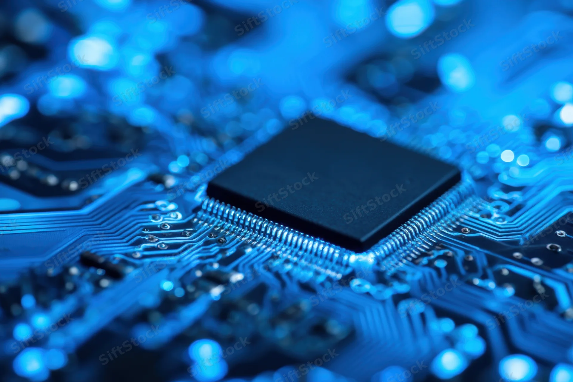 Close-up of a central processing unit on a blue circuit board